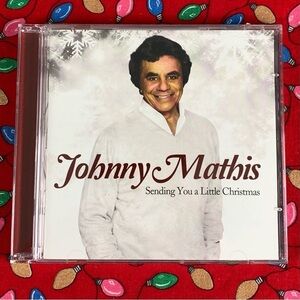 Johnny Mathis: Sending You a Little Christmas. Christmas CD.